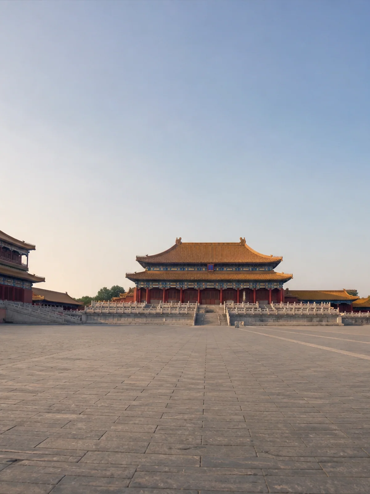 The red walls and golden roofs of the Forbidden City in Beijing