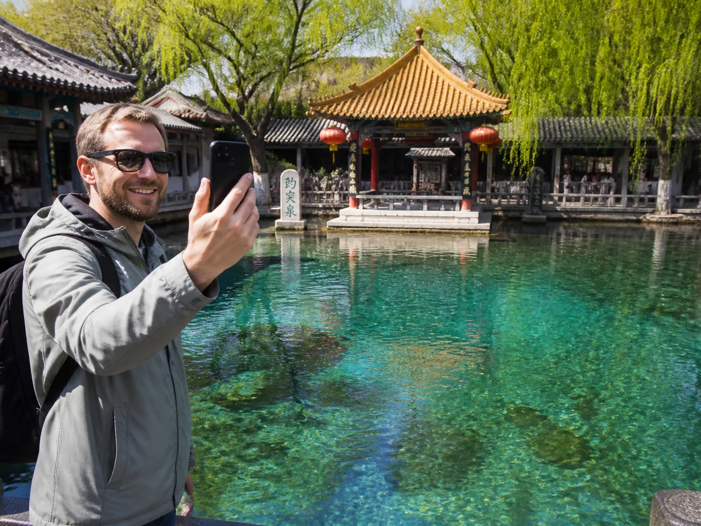 Visitor at clear spring pool