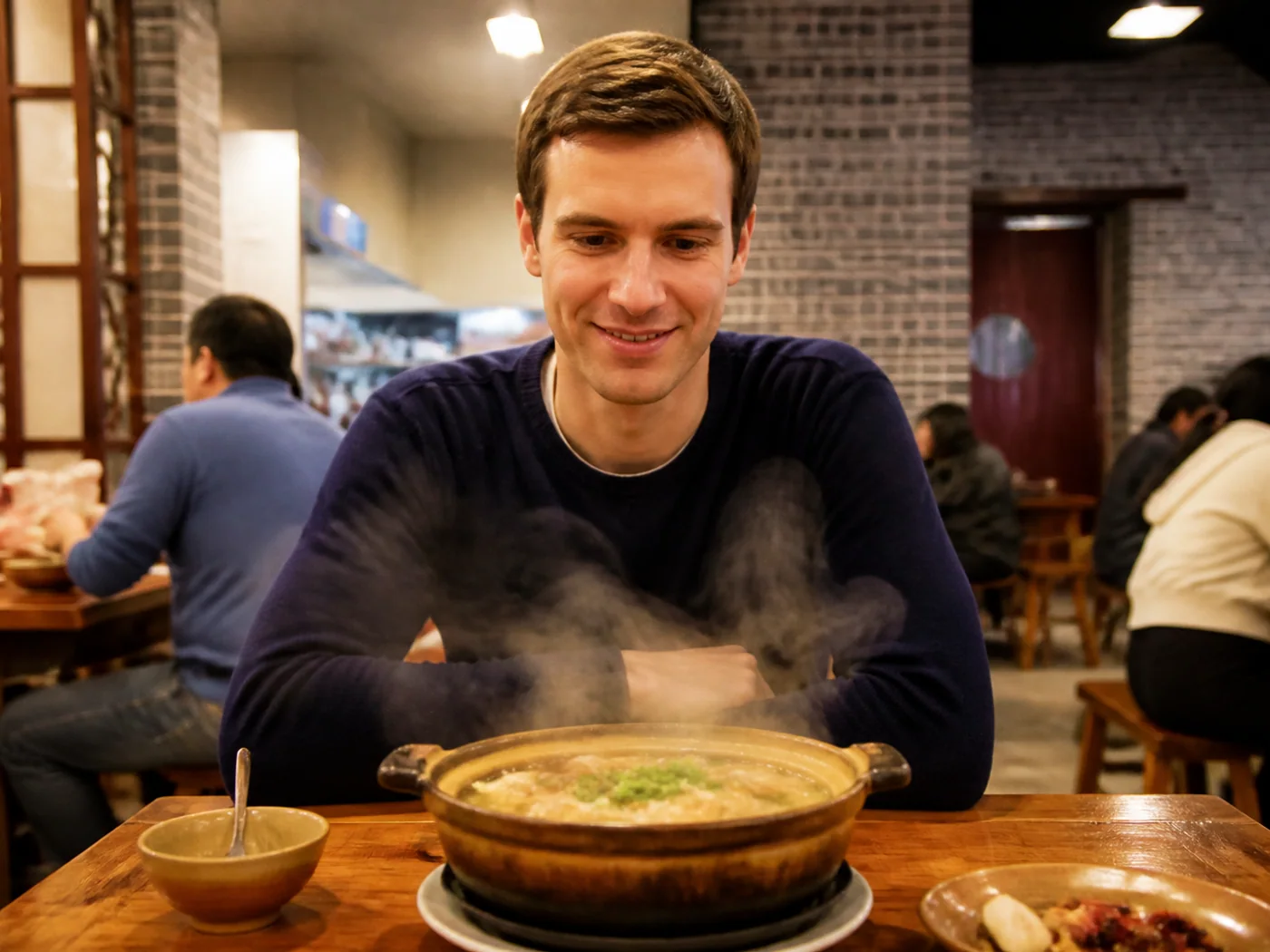 Traveler waiting for claypot soup
