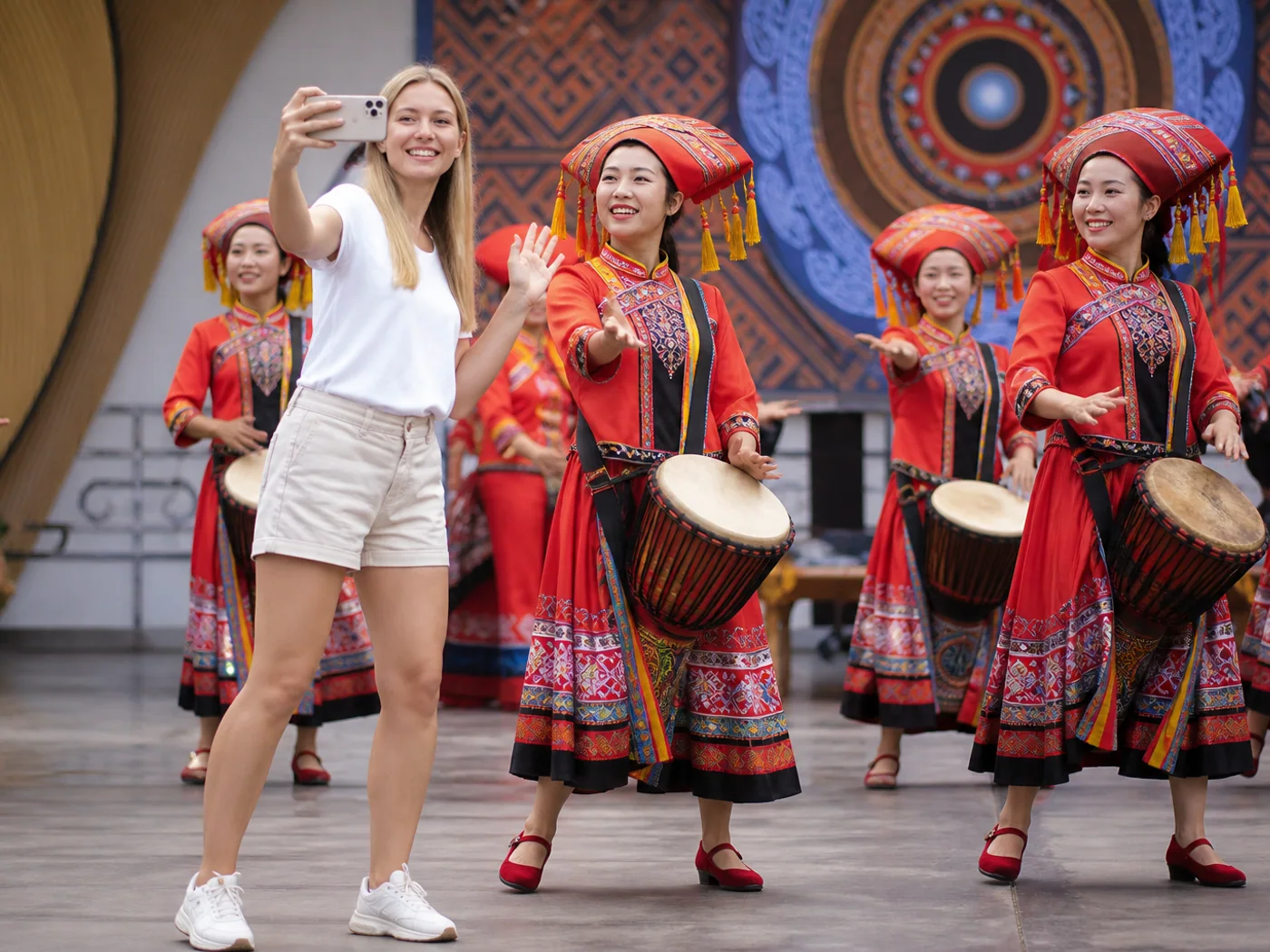 Travelers with Zhuang performers