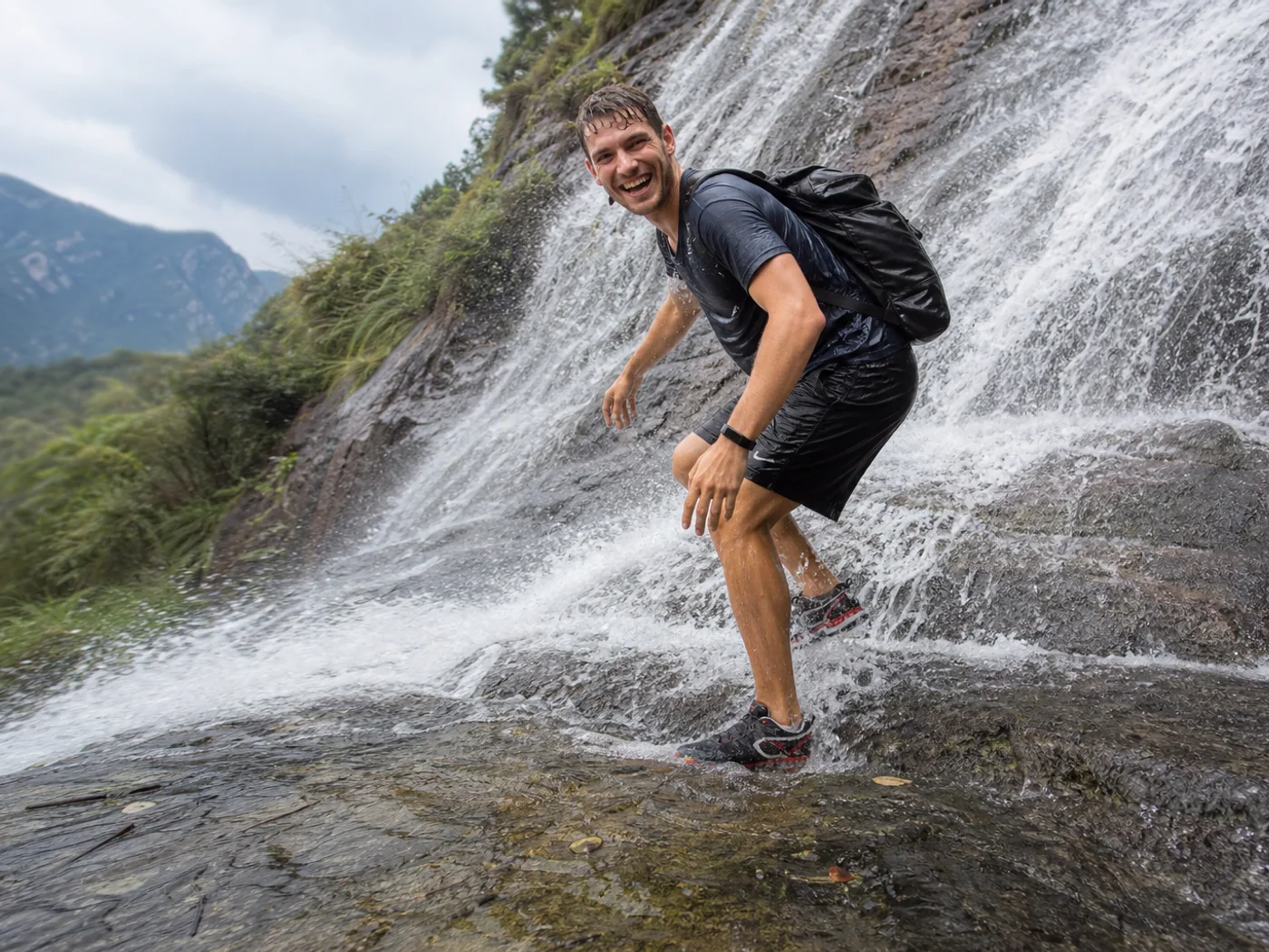 Hikers near Wenzhou waterfall